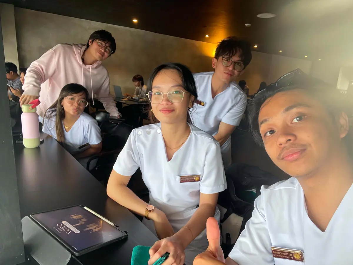 Angelica studying with her classmates